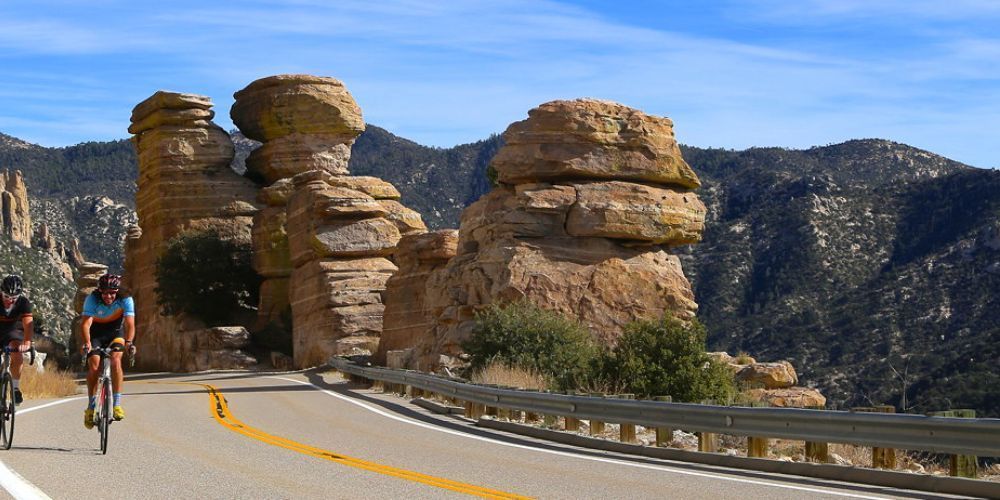 Cyclist riding through Arizona desert trail