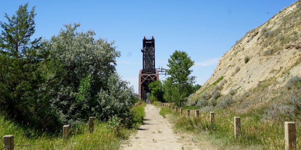 Cyclist riding on a trail in North Dakota's plains