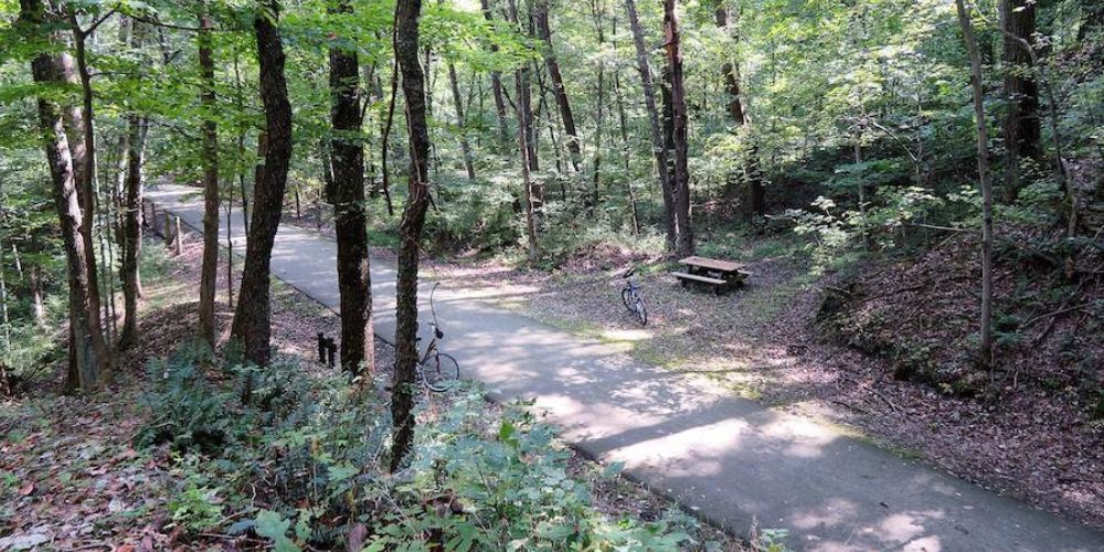 Cyclist biking along a trail in Ohio