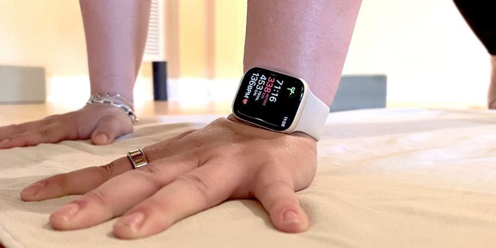 A person is wearing an apple watch on their wrist.