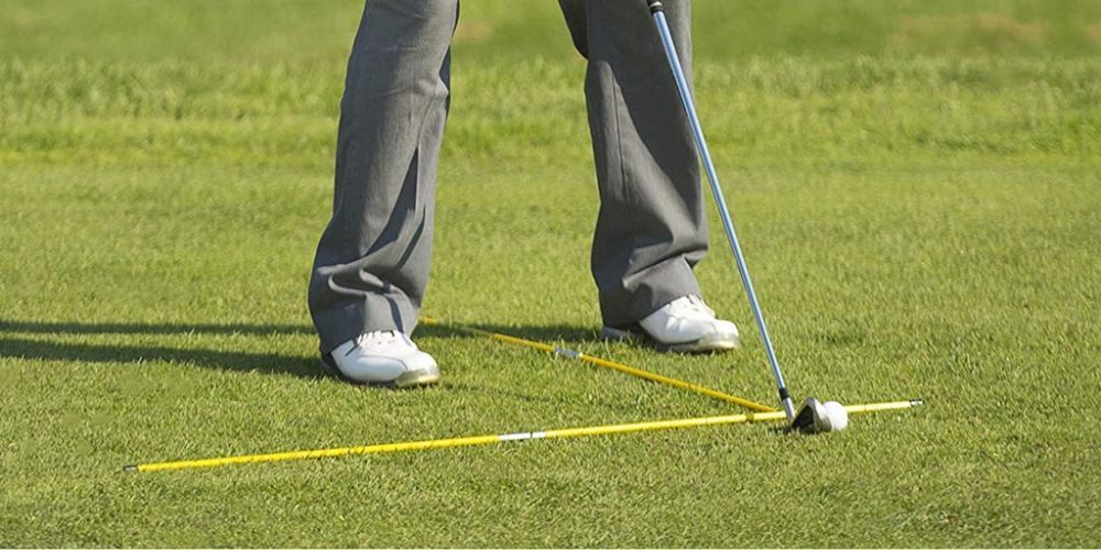 sticks for alignment of golf swing