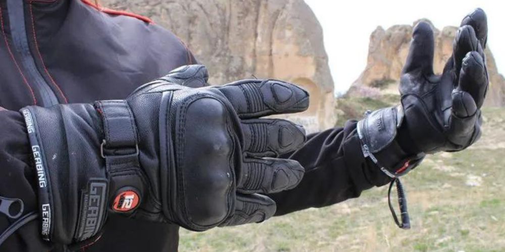 rider wearing heated motorcycle gloves