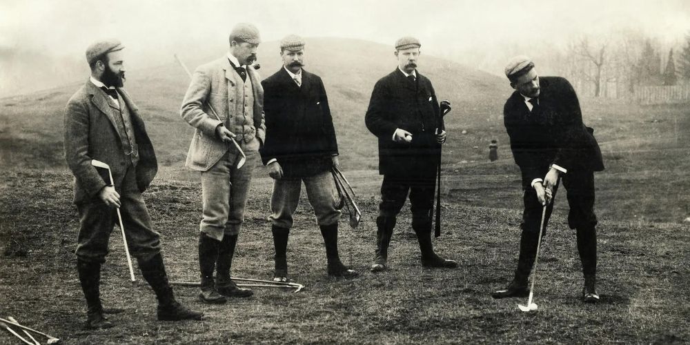 A group of men are playing golf in a black and white photo