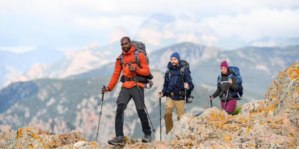 A group of people are hiking up a mountain.