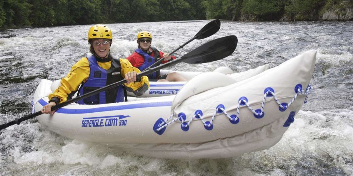 inflatable kayak in white water