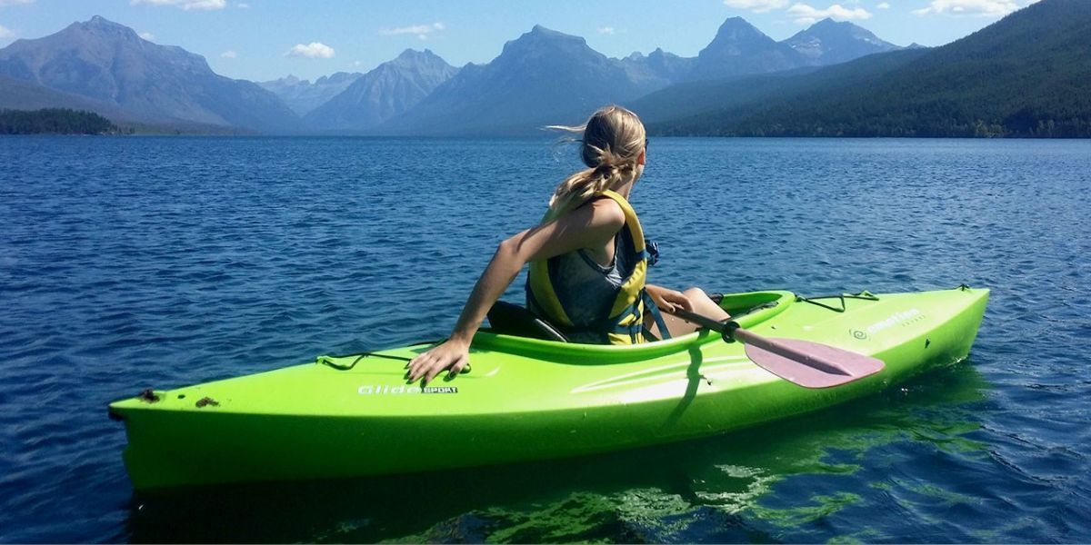 green kayak on a lake