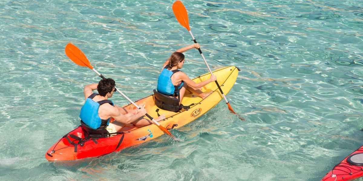 2 person kayak on clear water