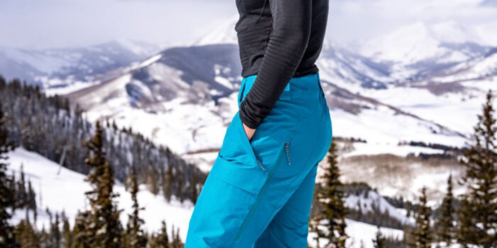 Pair of women's ski pants in a snowy environment