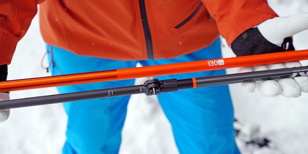 Ski poles in action with skier