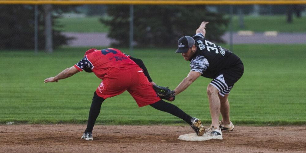 runner tagged out in slow pitch softball game