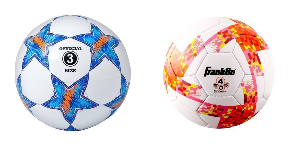 Two soccer balls are sitting next to each other on a white background.