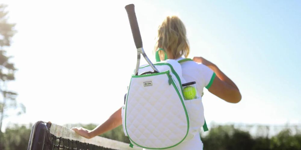 woman with a tennis backpack