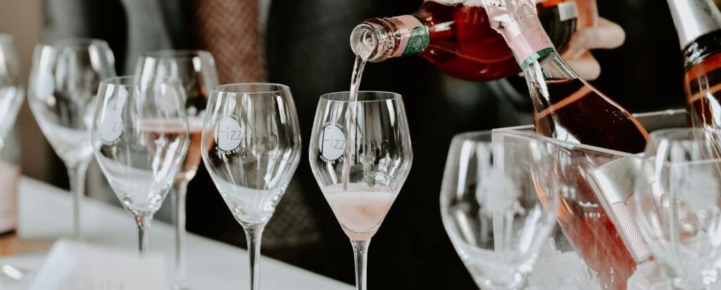 Champagne being poured into a Fizz glass.