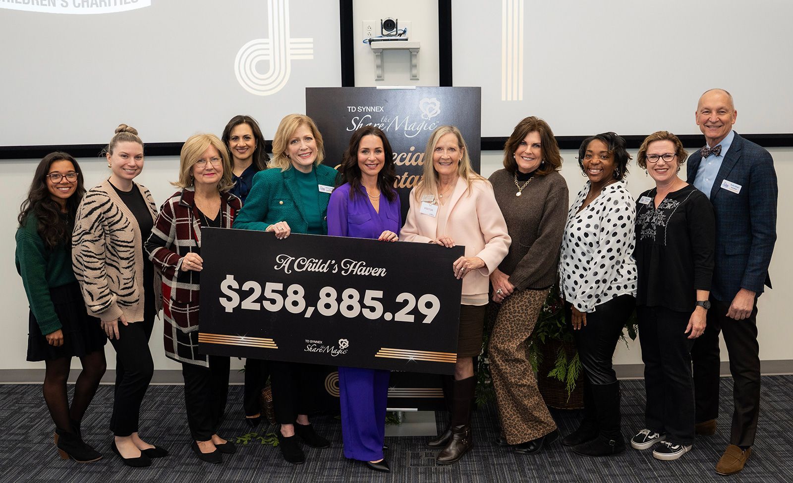 2025 Share the Magic A Child's Haven check presentation.