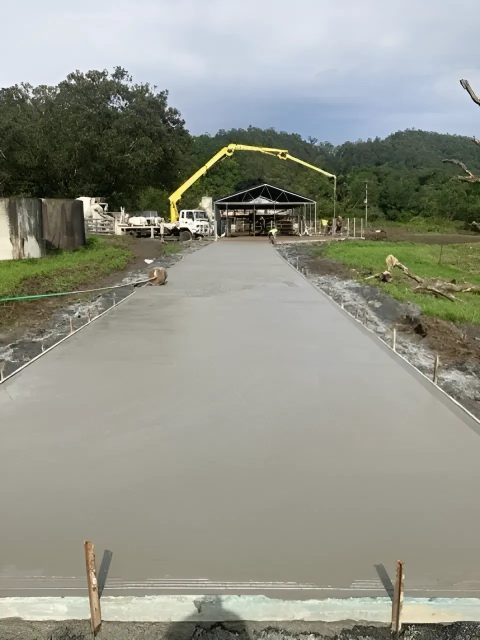 A Concrete Driveway Is Being Built In A Field — Northern Rivers Concrete Construction In Dalby, NSW