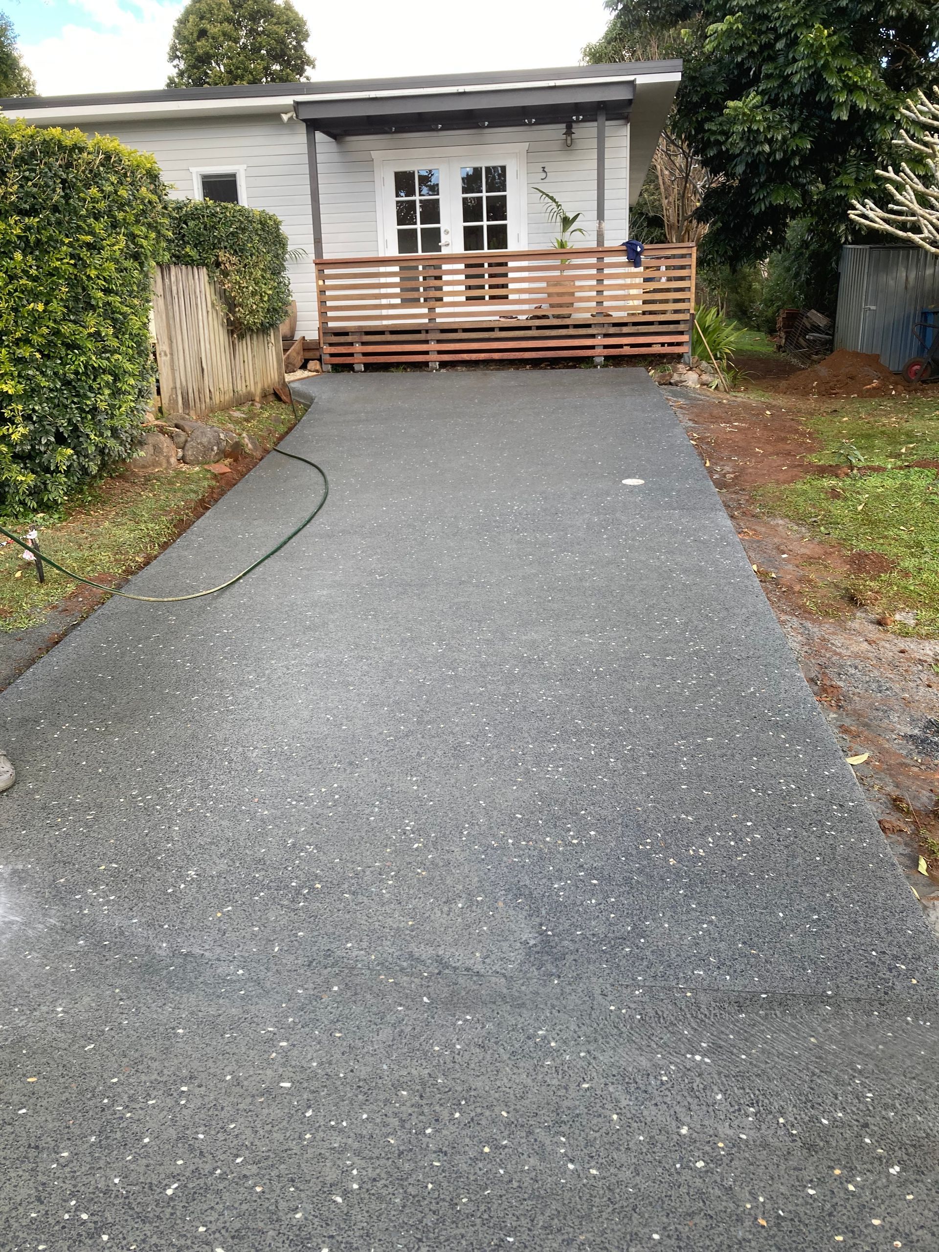 A Gravel Driveway Leading To A House — Northern Rivers Concrete Construction In Lismore, NSW