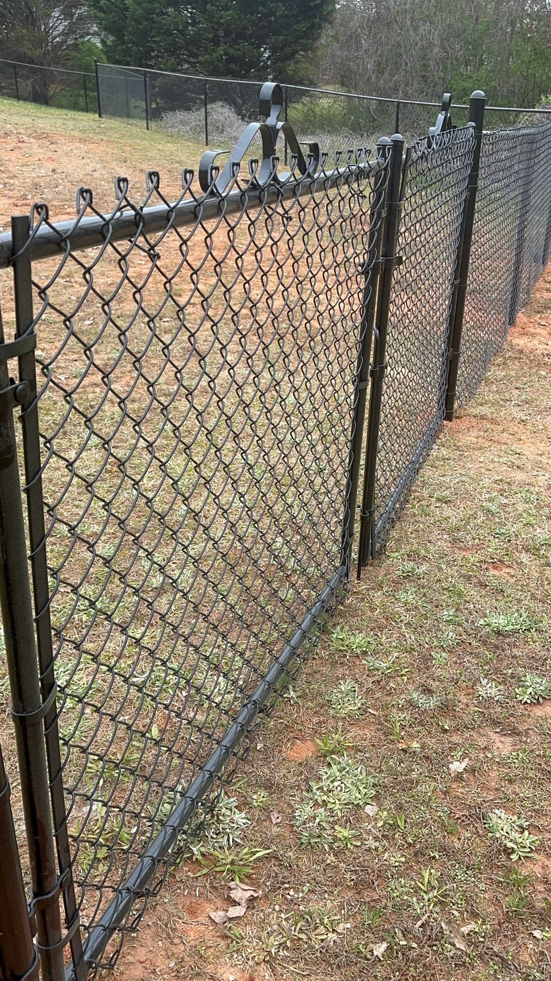 Building a Cedar Picket Wood Fence Scene Stringers Backer Rails No People Box of Screws Power Tools Screwdriver Framing Square.