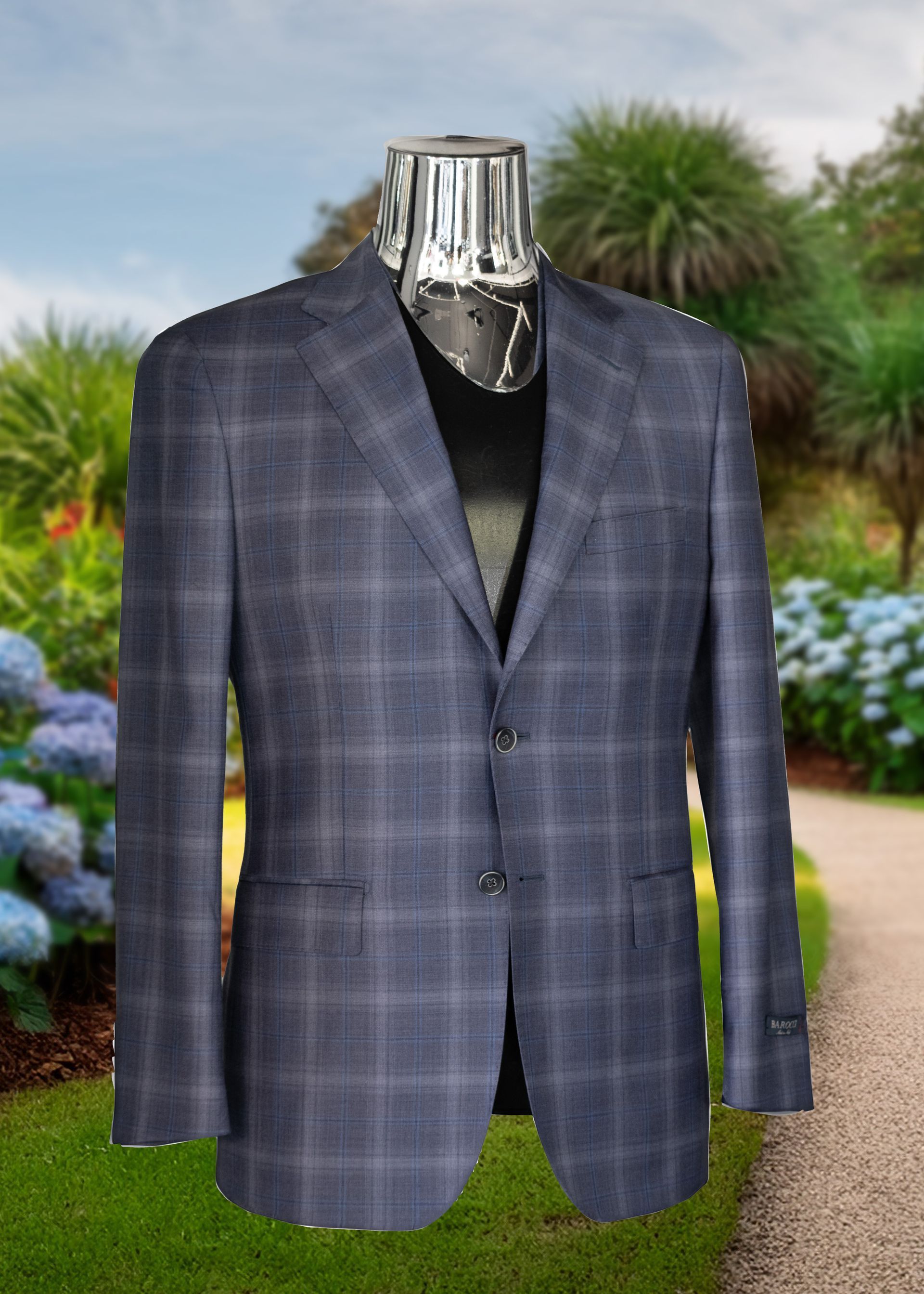 Blue plaid blazer on a mannequin, set against a blurred garden backdrop.