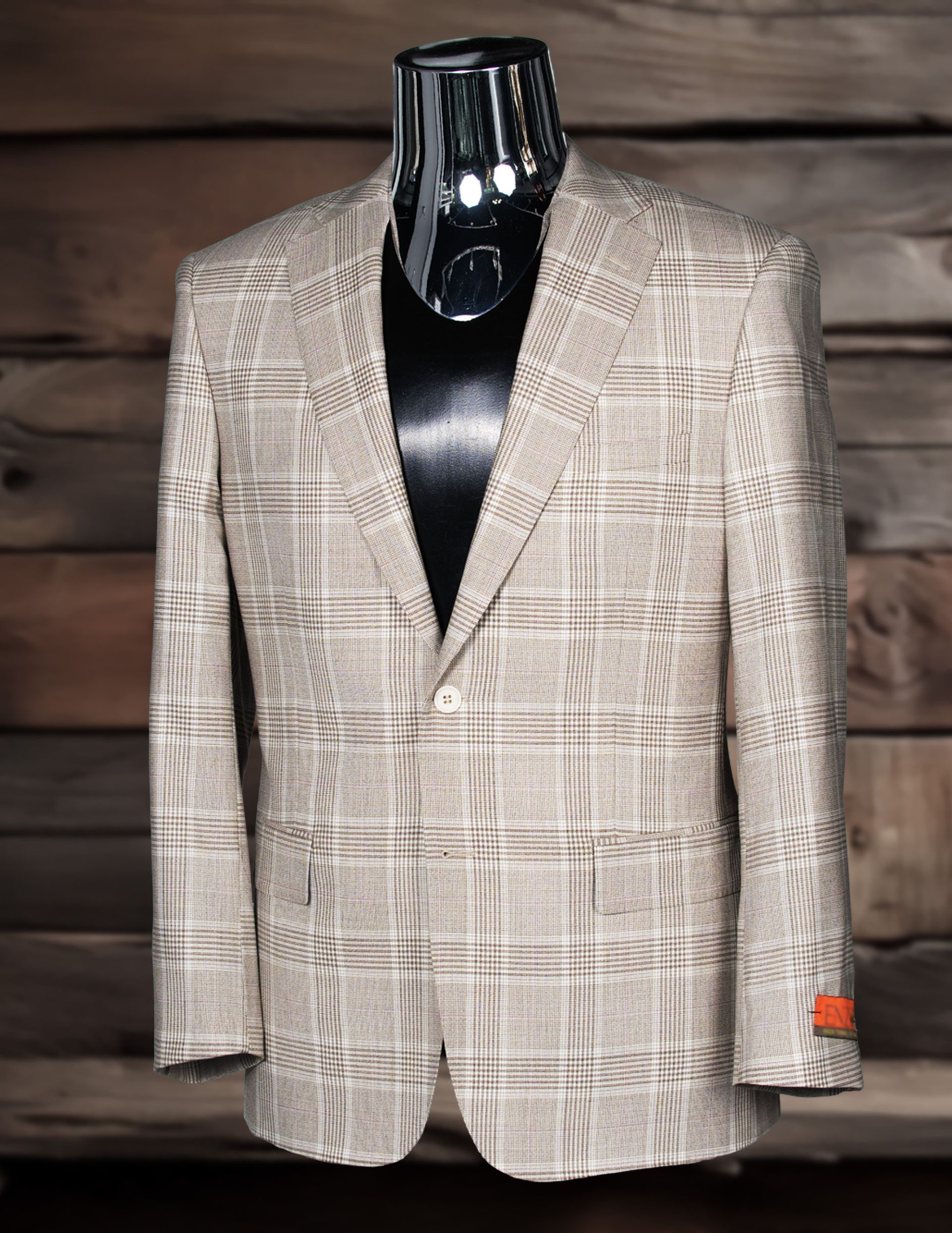Tan plaid men's blazer on a black mannequin, set against a wooden background.