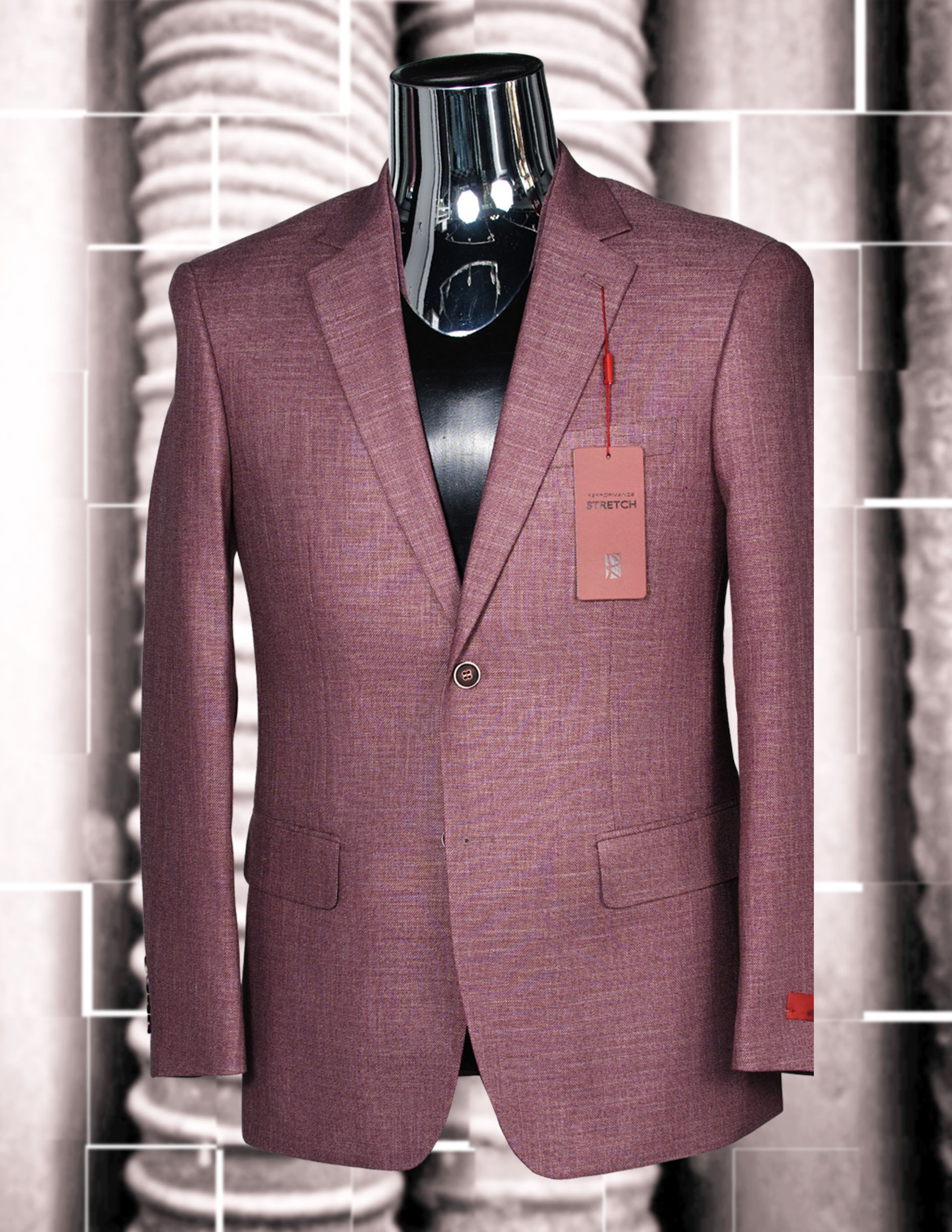 Maroon blazer on a mannequin with a price tag. Background with textured pillars.