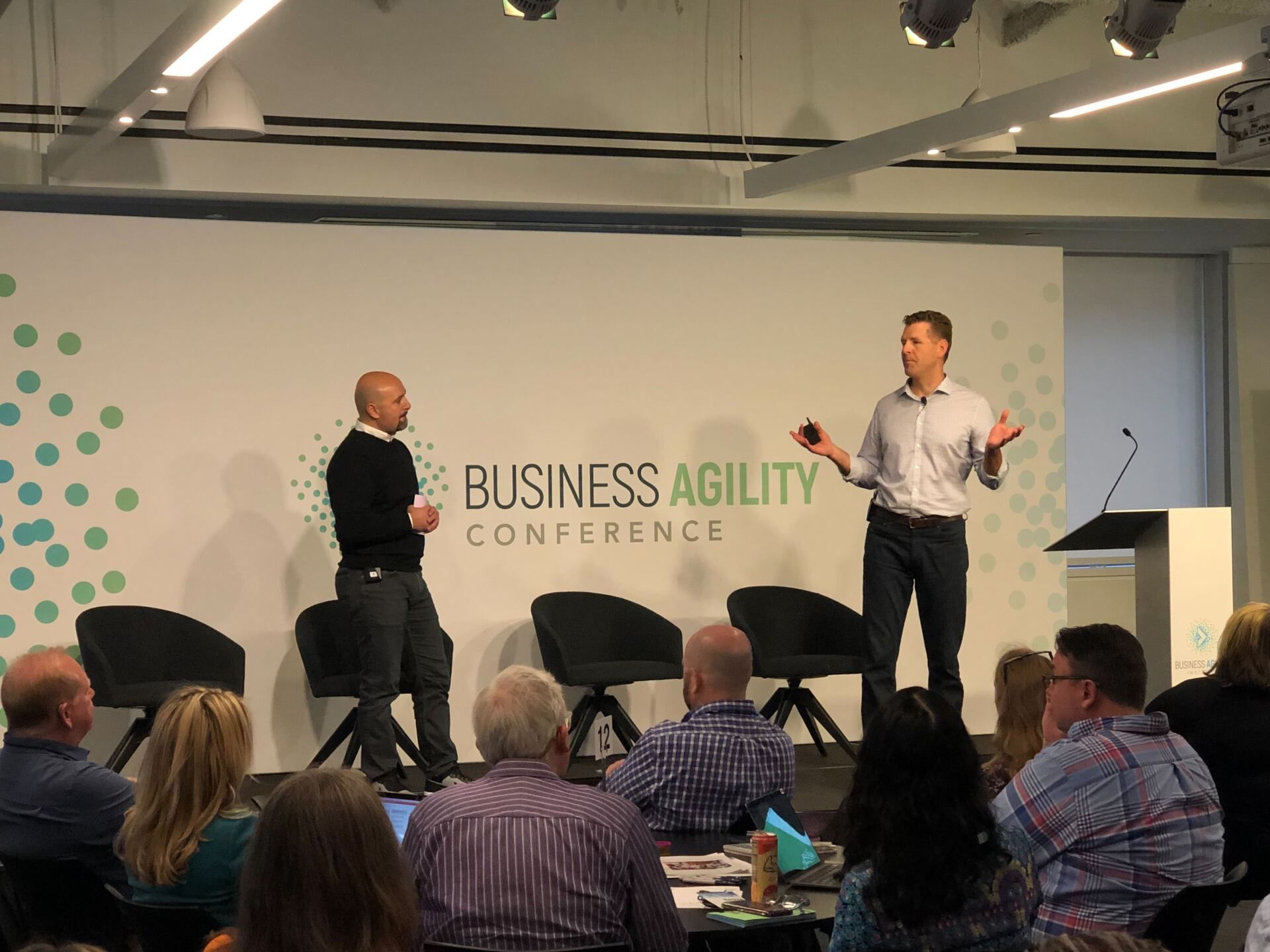 Pete Behens and Amjed Al-Zoubi on stage at the Business Agility Conference in New York