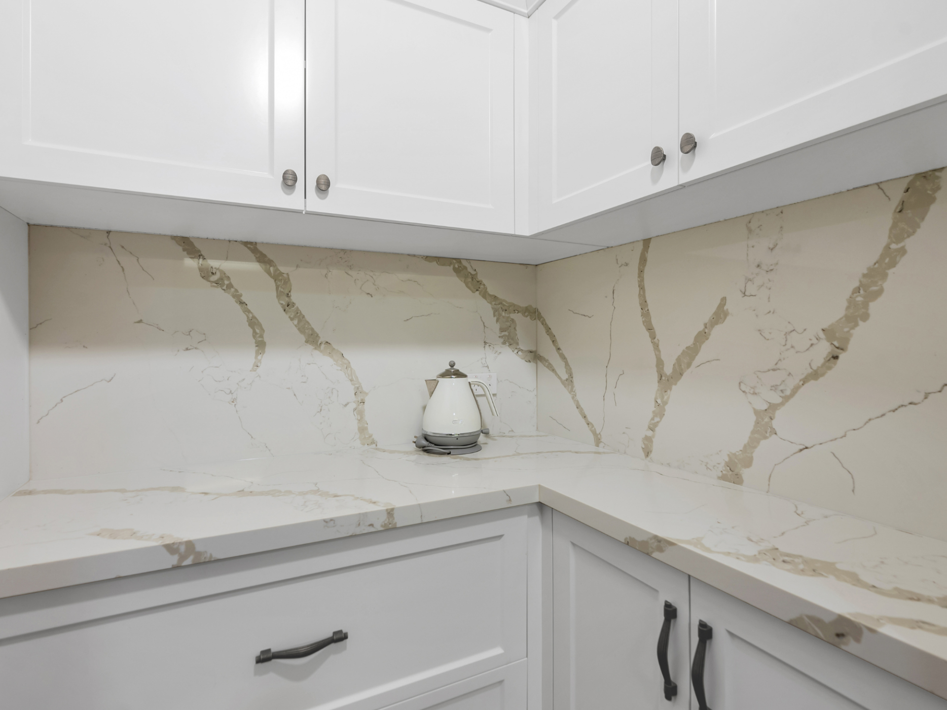 A Bathroom With Two Sinks, Two Mirrors and a Bench — Kitchens by CCJS in Bungalow, QLD