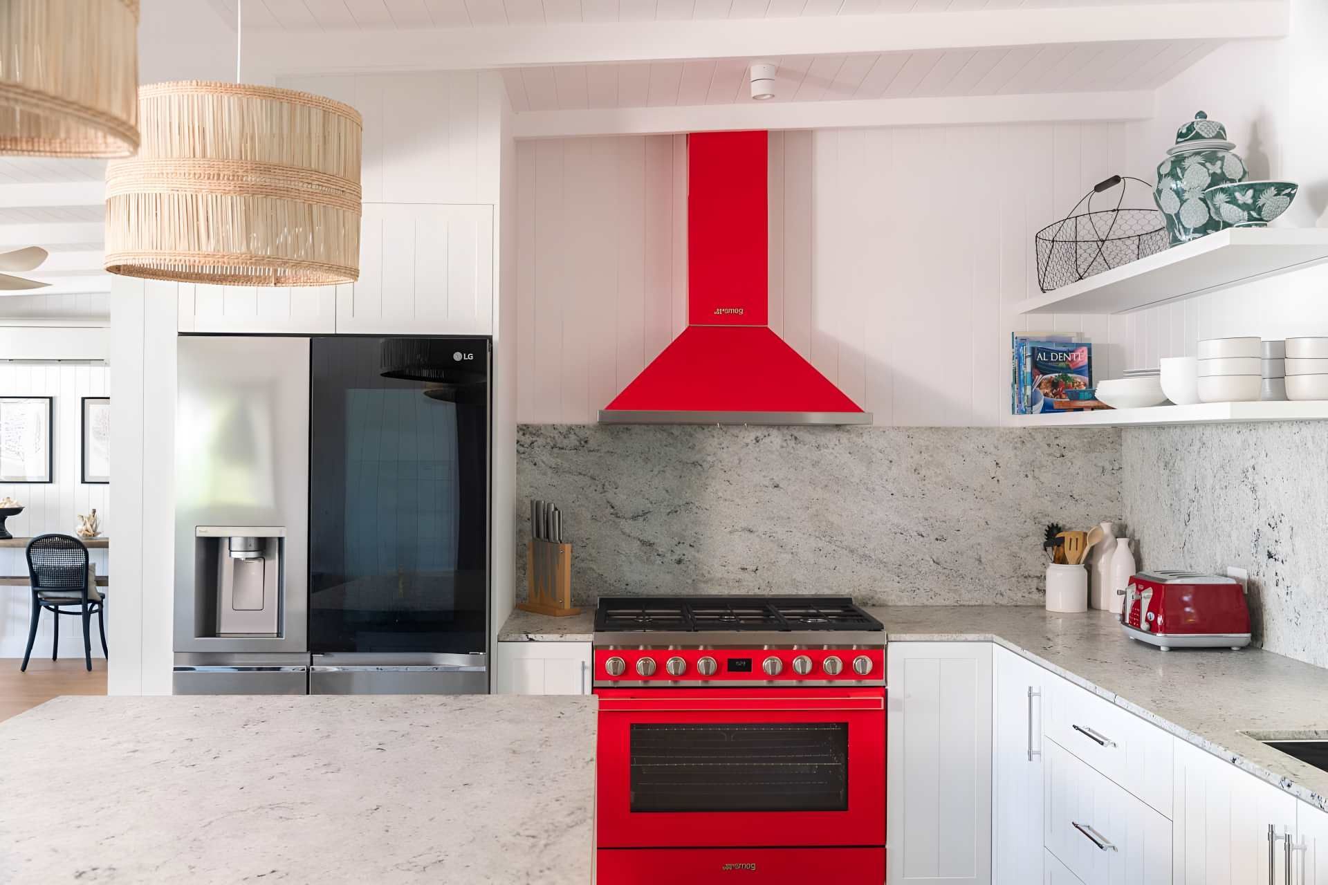 A Kitchen With a Red Stove and a Red Hood — Kitchens by CCJS in Bungalow, QLD