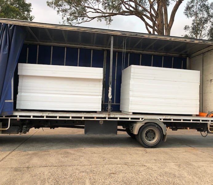 A truck is loaded with EPS Panels