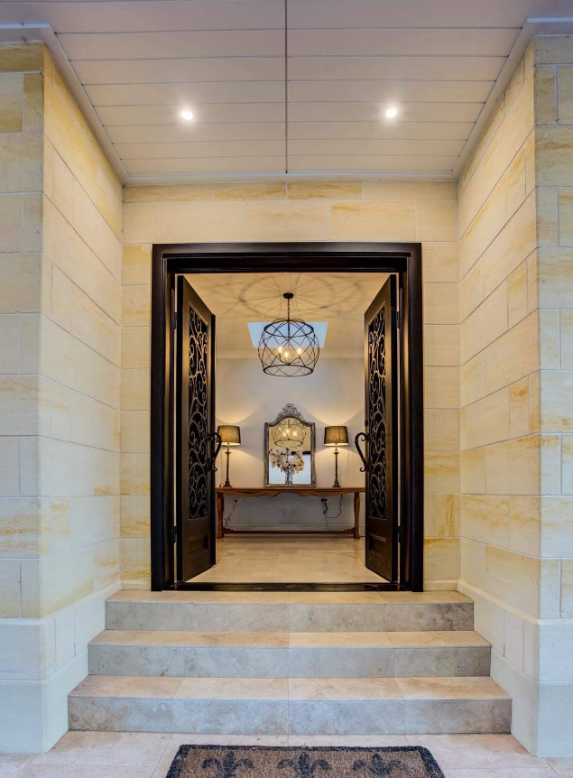 Main entrance of a beautiful house with some stone cladding work done - PRO-LAY Wall and Floor Tiling, Central Coast, NSW