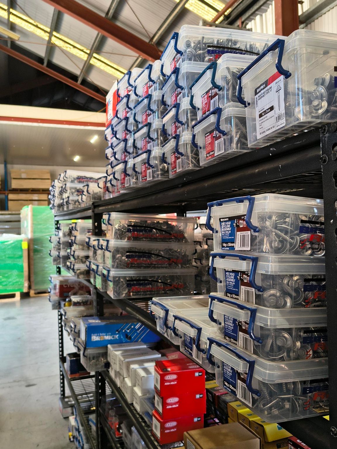 A Display of Several Orange and Red Pneumatic Nail Guns — Kev's Group QLD in Kawana, QLD