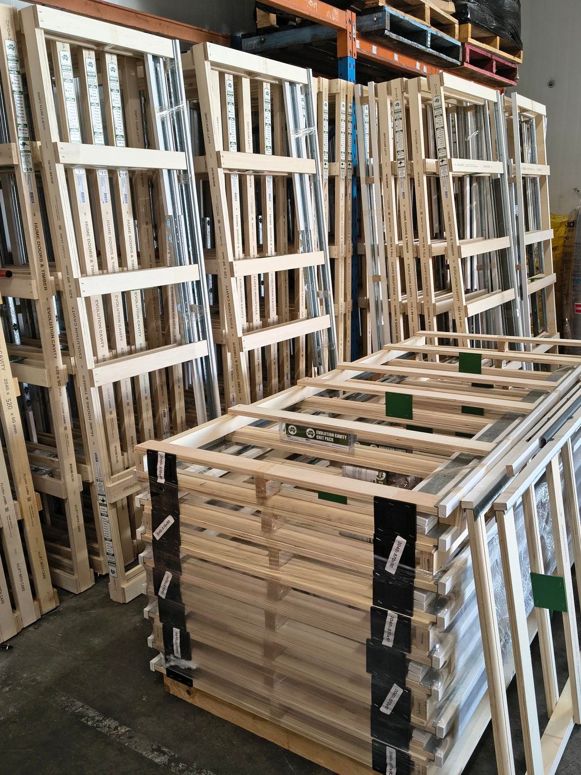 Man Browsing Wood Trim in a Hardware Store — Kev's Group QLD in Kawana, QLD