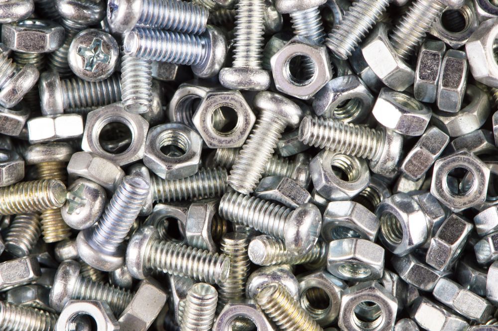 Pile of Assorted Metal Bolts and Nuts — Kev's Group QLD in Kawana, QLD