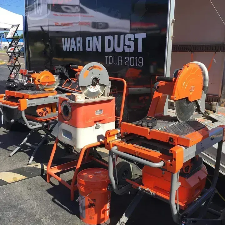 Orange Construction Saws and Dust Collector on Display — Kev's Group QLD in Kawana, QLD