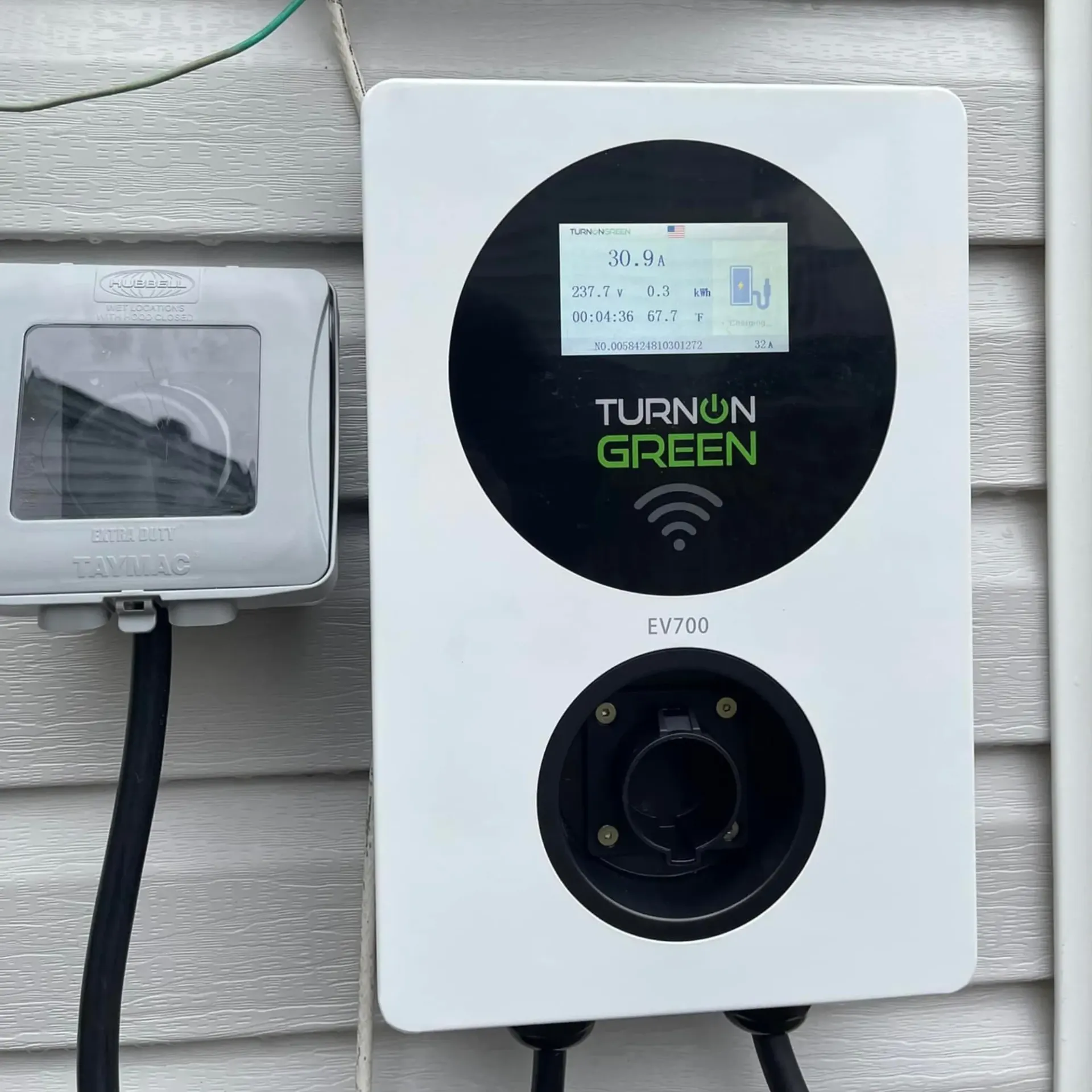 Installed level 2 EV charging station with weatherproof outdoor electrical wiring