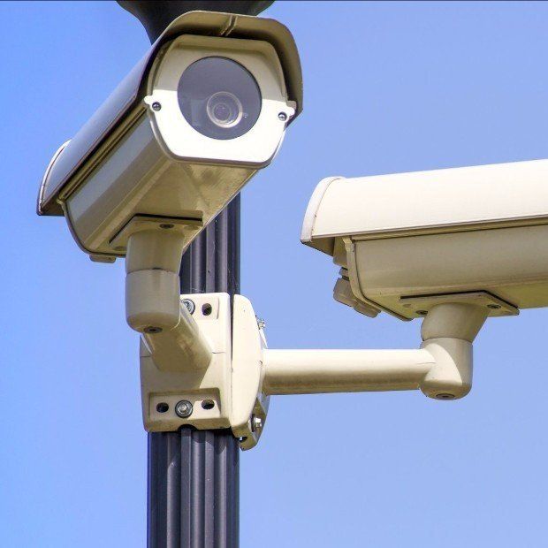A coffee shop with a flooded floor and a counter.