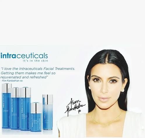 A Woman is Standing in Front of a sign that says Intraceuticals — Bernadette's Beauty Care in Sarina, QLD