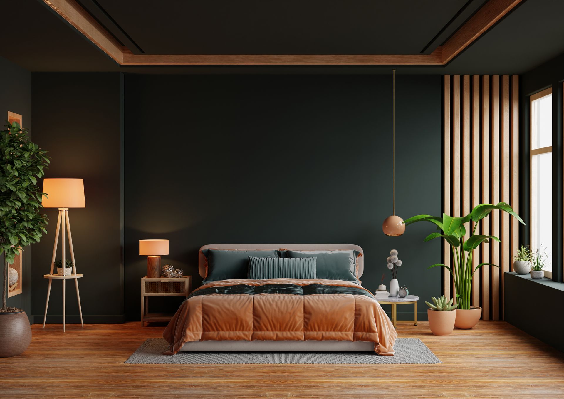 A bedroom with a bed , nightstands , lamps , and plants.