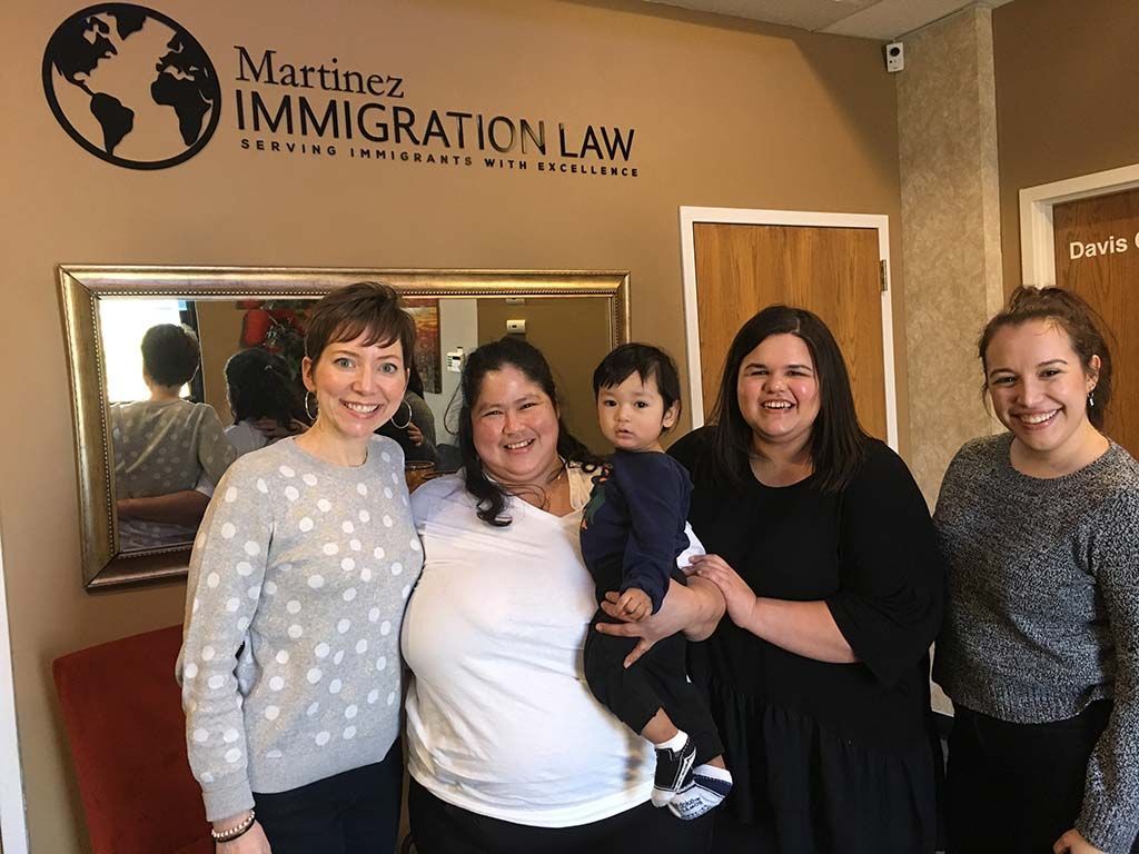 Attorney Andrea Martinez celebrating a successful case