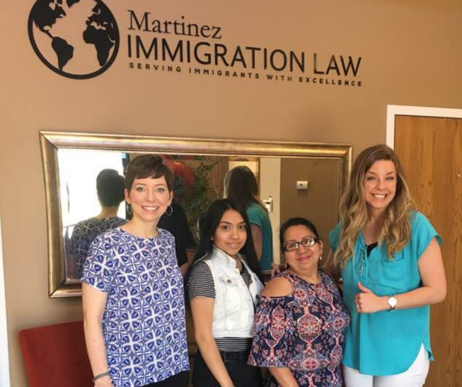 Attorney Megan Galicia and Attorney Andrea Martinez with clients