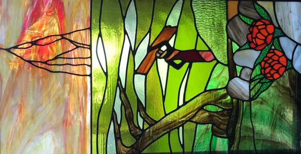 A Stained Glass Window With A Bird Sitting On A Tree Branch — Townsville Stained Glass In Townsville, QLD