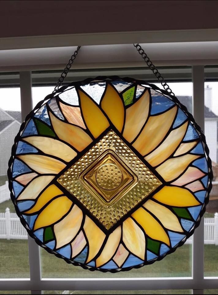 A Stained Glass Sunflower Is Hanging On A Window — Townsville Stained Glass In Mackay, QLD