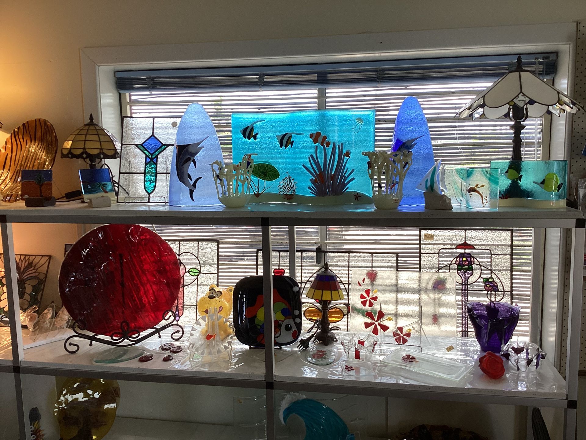 A Store Filled With Lots Of Glass Items And Lamps — Townsville Stained Glass In Aitkenvale, QLD
