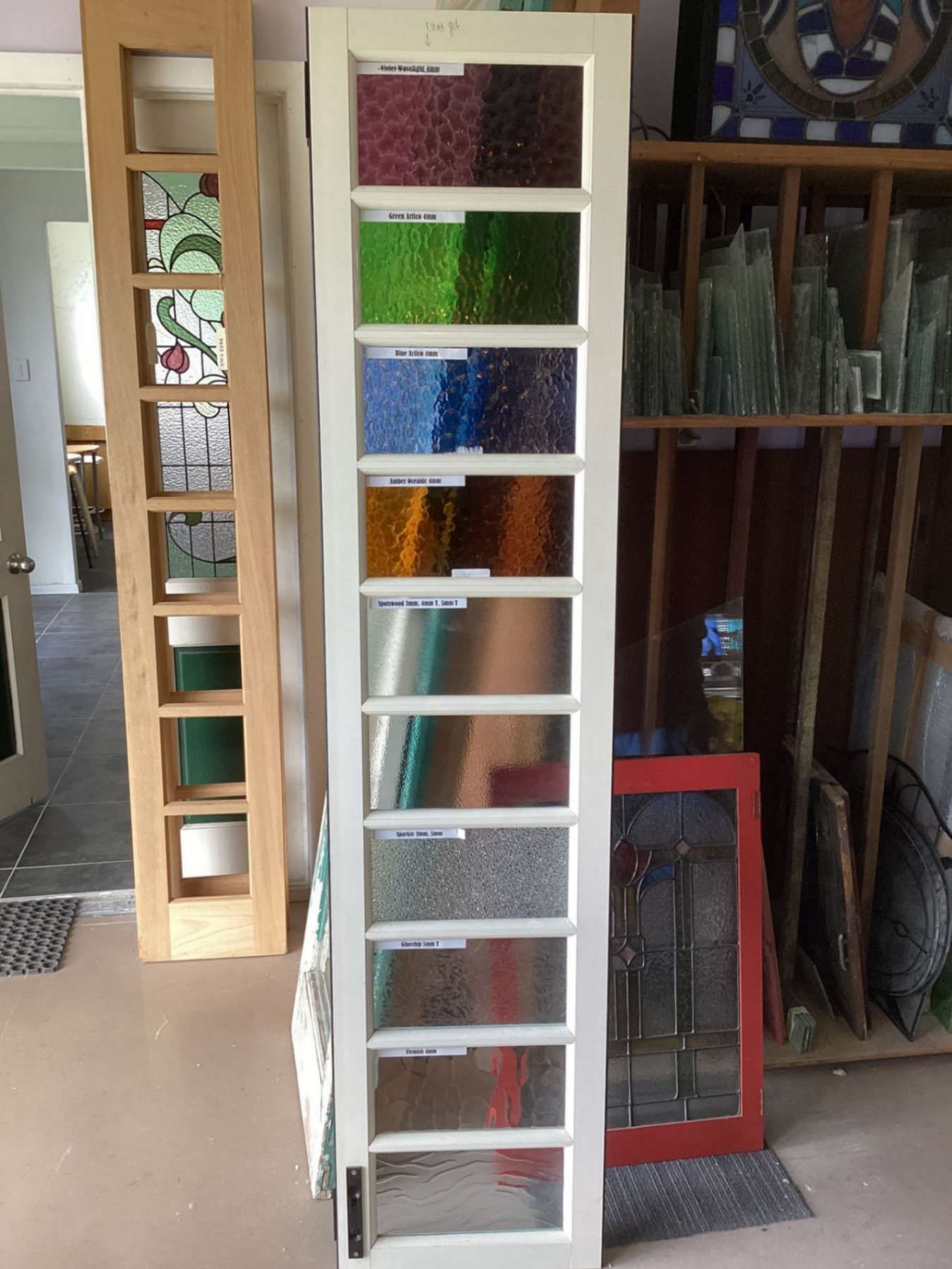 A White Door With Stained Glass Panels On It — Townsville Stained Glass In Aitkenvale, QLD
