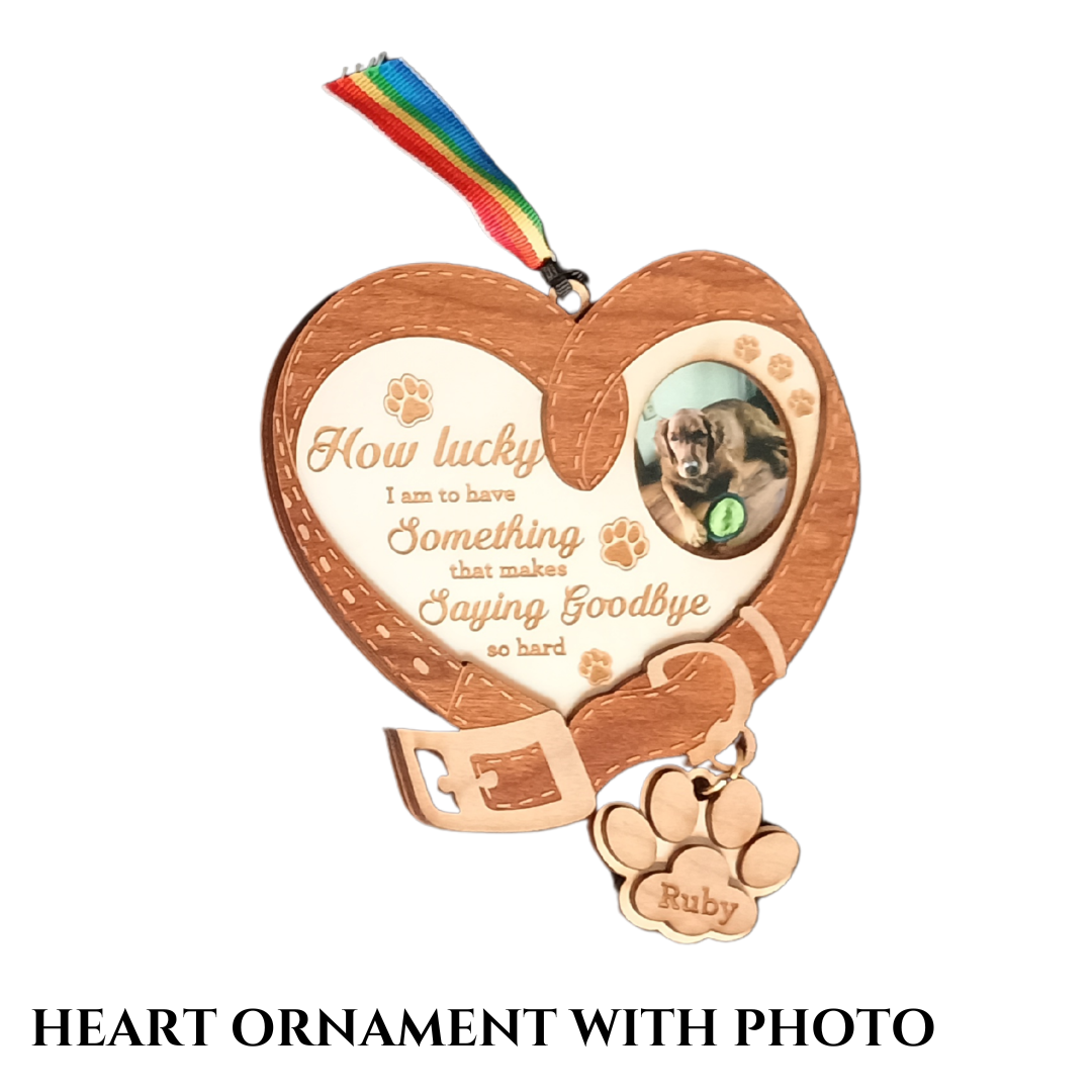 Wood heart ornament with photo of pet, pet's name, and a phrase.