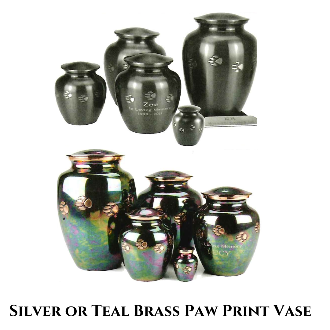 4 silver brass paw print vases of varying sizes, some engraved with the name of a pet, all with paw prints across the vases