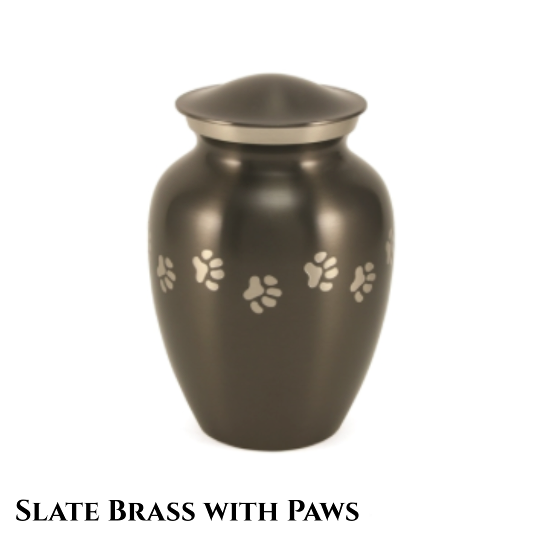 Dark slate, vase-shaped urn with brass paw prints in a horizontal row across the body of the urn.