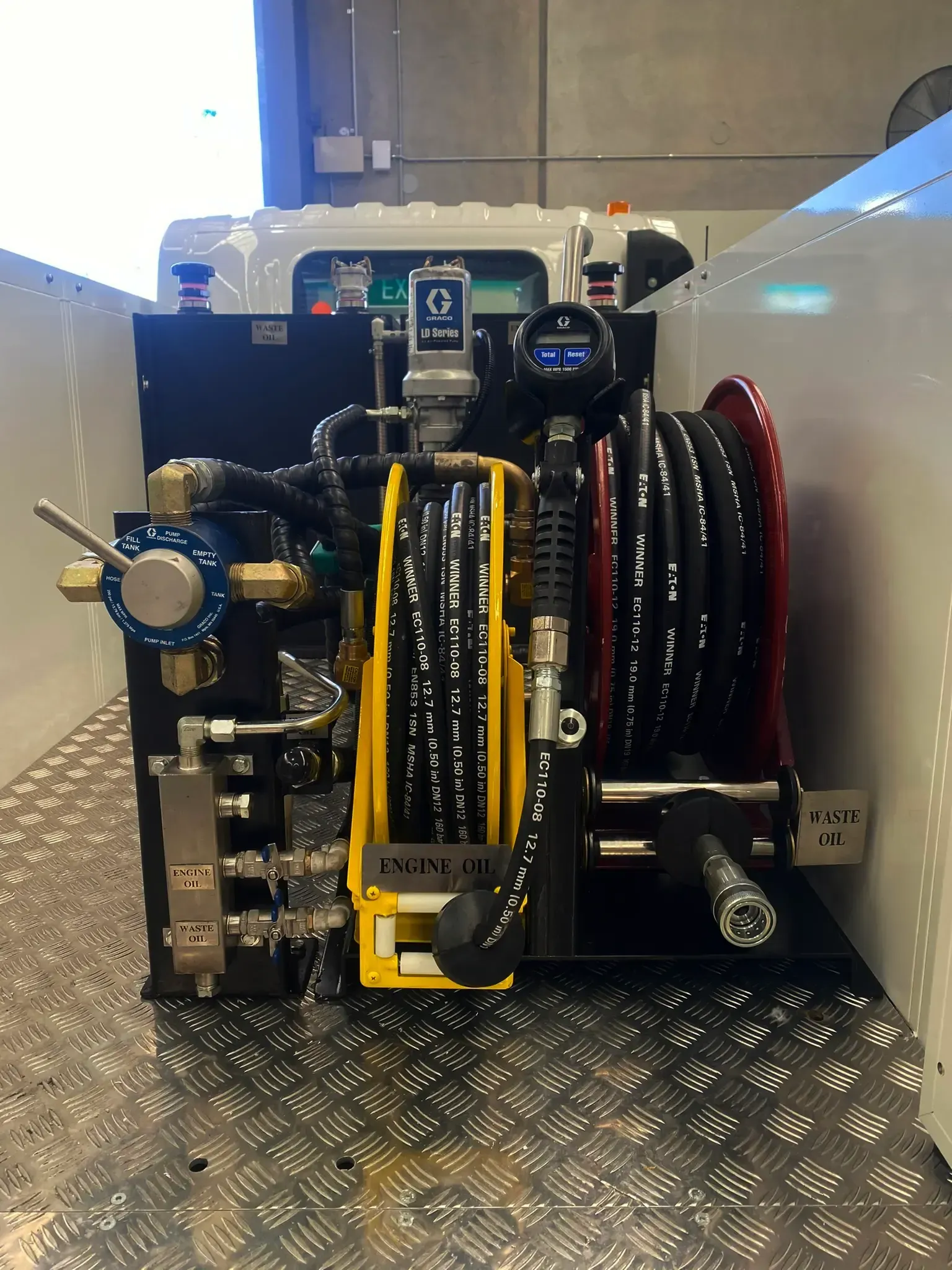 A machine with a bunch of hoses attached to it