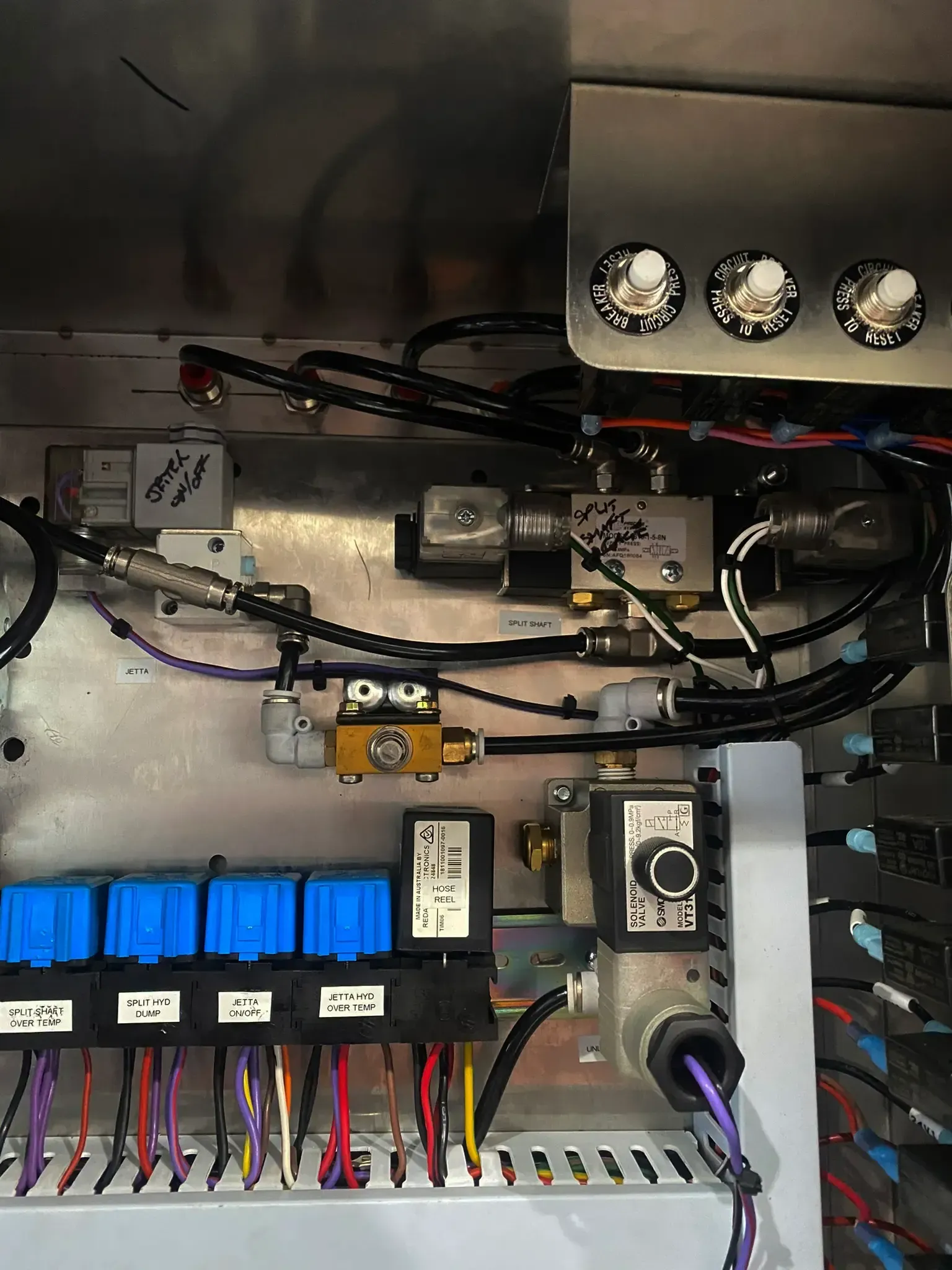 A bunch of wires are connected to a electrical box