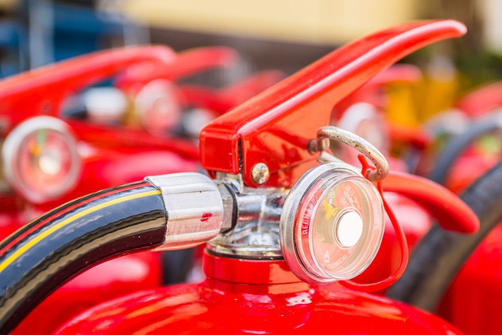 Close-up of a Bright Red Fire Extinguisher — Southern Trade Services in Warburton, VIC