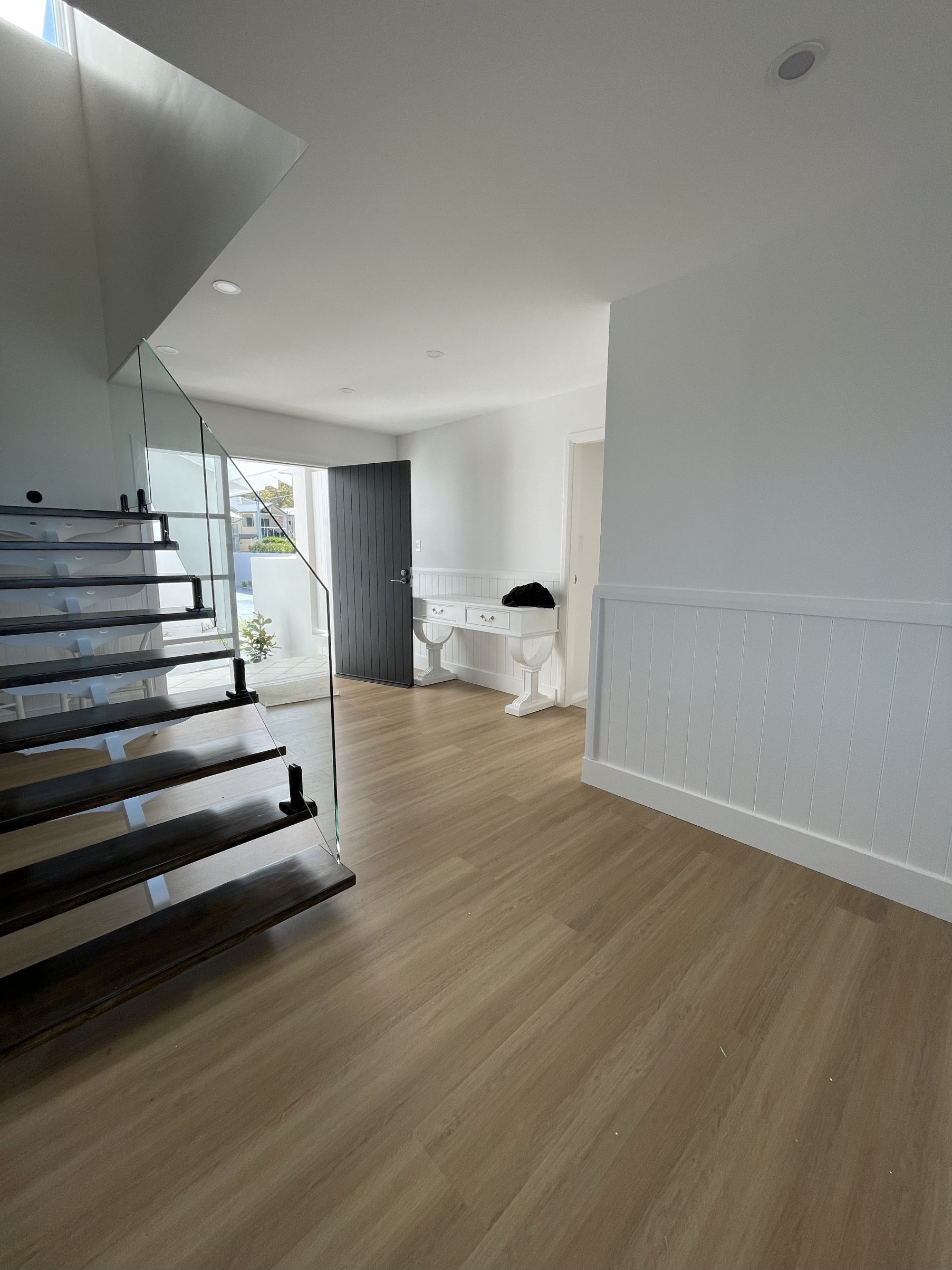 A Wooden Deck Is Being Built On The Side Of A House — Penman Projects In Salamander Bay, NSW